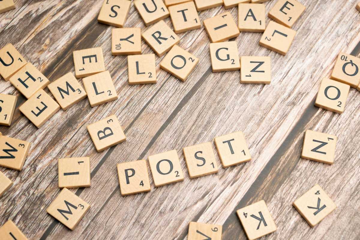 Scrabble tiles spelling the word “post,”